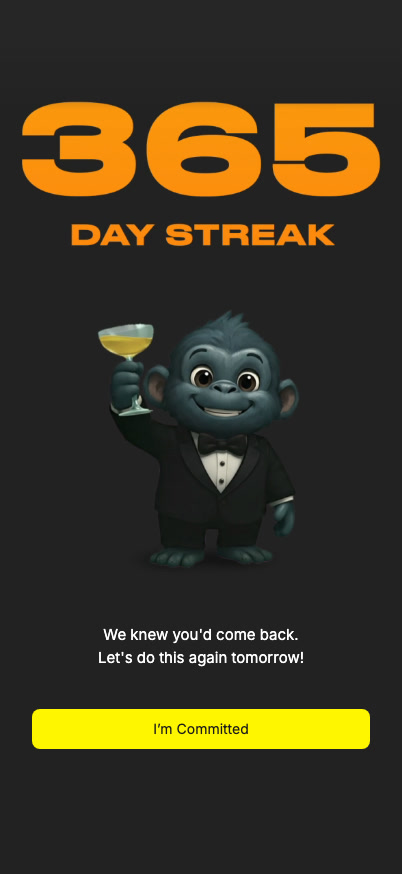 A 365-day streak milestone screen: the Rilla gorilla in a tuxedo raising a glass, with a commit button.